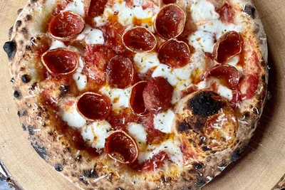 Blazin Sunn Pizza logo